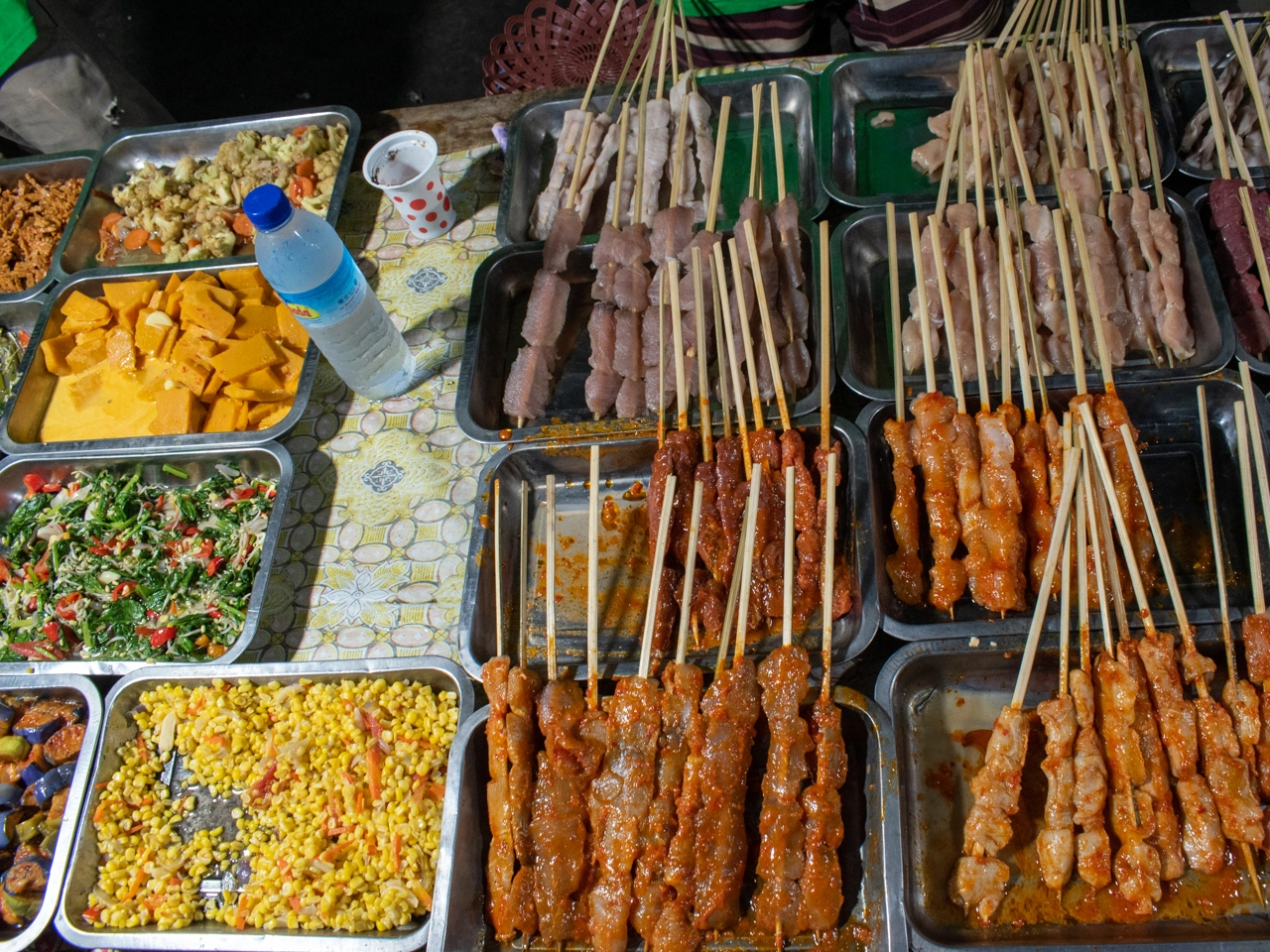 side dishes and skewers at gili trawangan night market