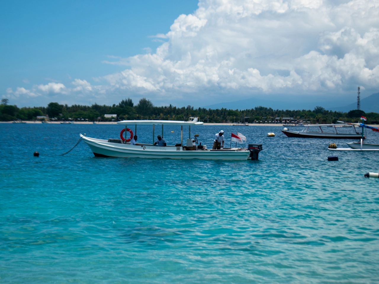 boat on clear water of gili trawangan island